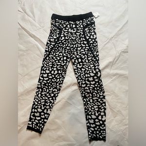 Women’s black and white leopard skinny fit dress pants
